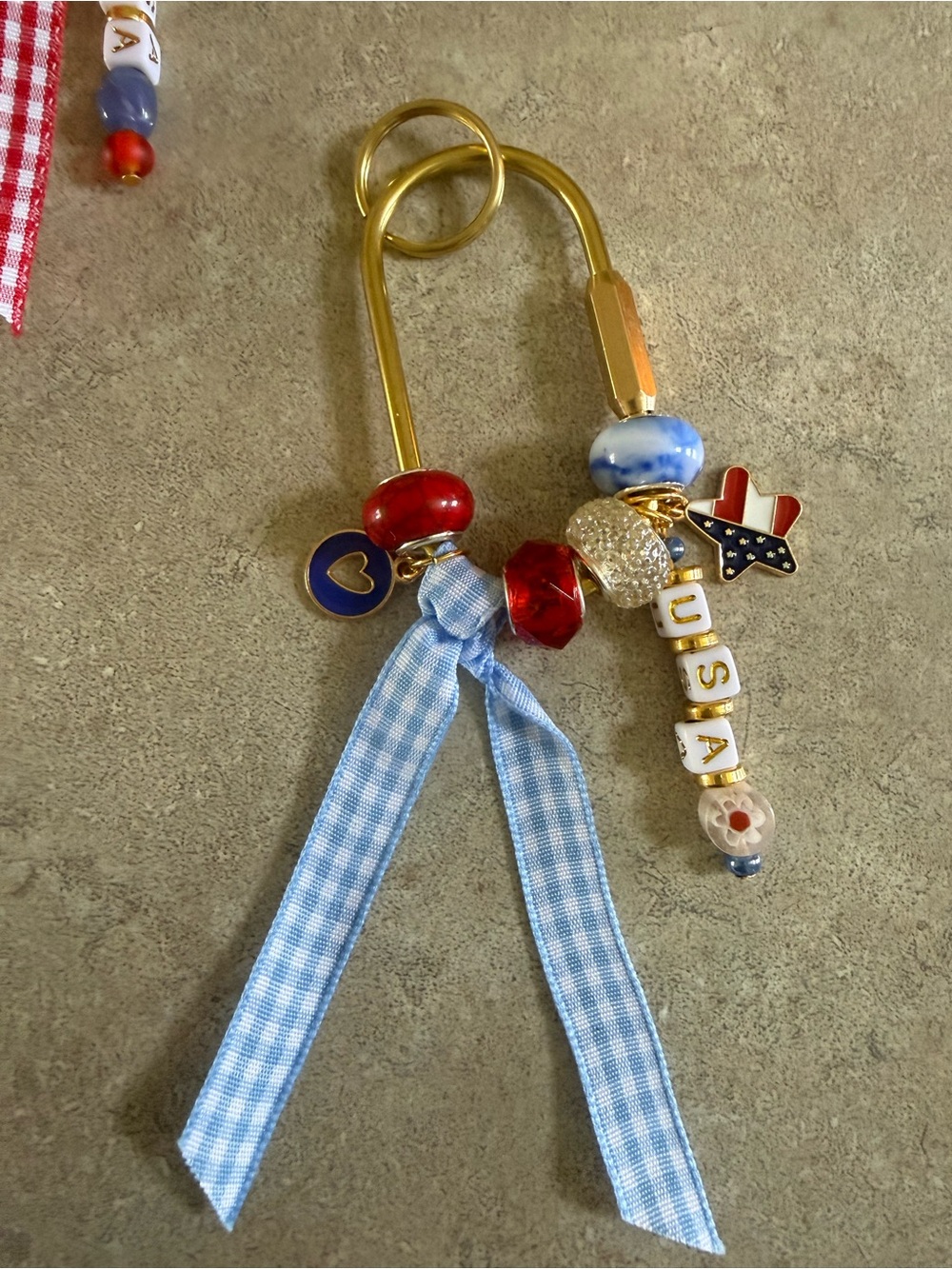 Kids USA Charm Keyring with Blue Ribbon